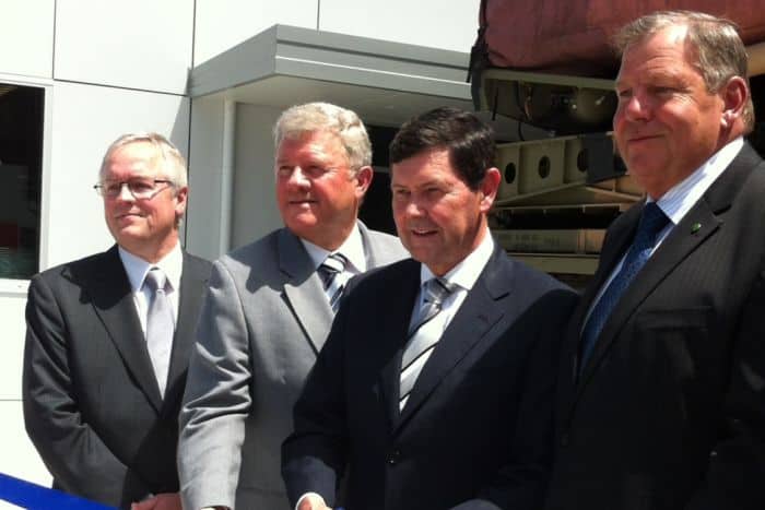 Photo: Defence Minister Kevin Andrews (second from right) with Paterson MP Bob Baldwin (right) at Williamtown for the official opening of a new Lockheed Martin radar operations facility.